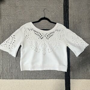 Free People cropped white sweatshirt with cutouts